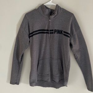 Gray sweatshirt. Has a zip collar. Size Large.